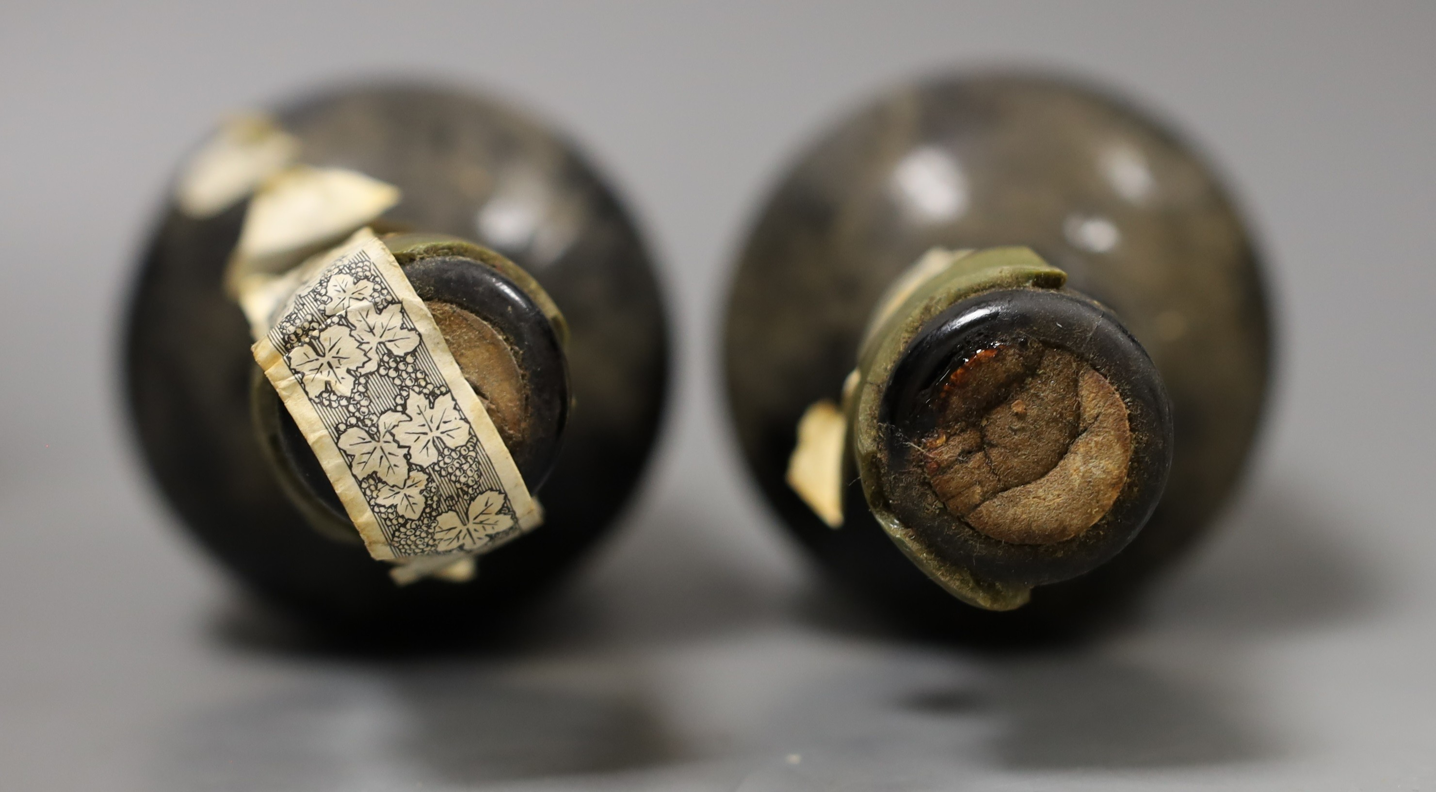 A four bottles of Taylor’s Quinta De Vargellas vintage port, two bottles dated 1965, one dated 1967 and the other 1972
